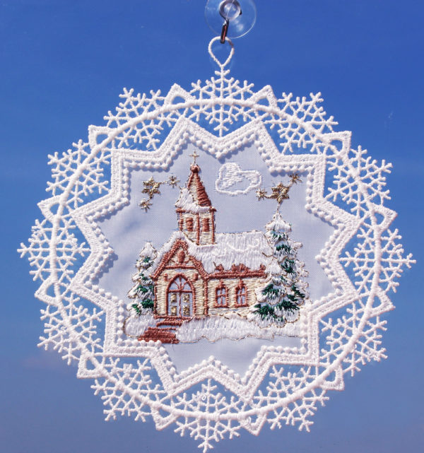 Schneestern mit Kirche