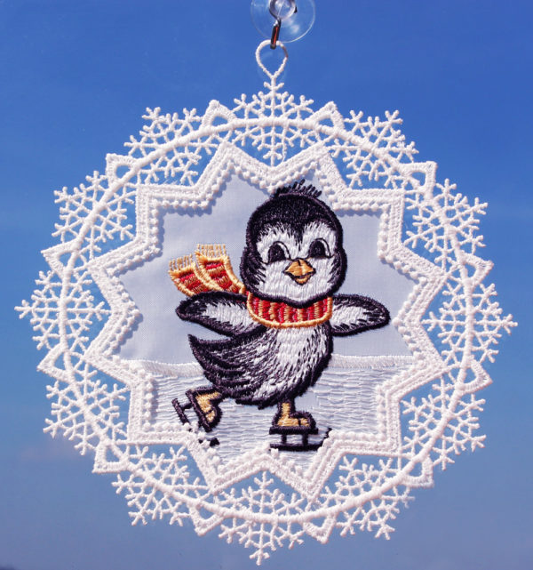 Schneestern mit Pinguin